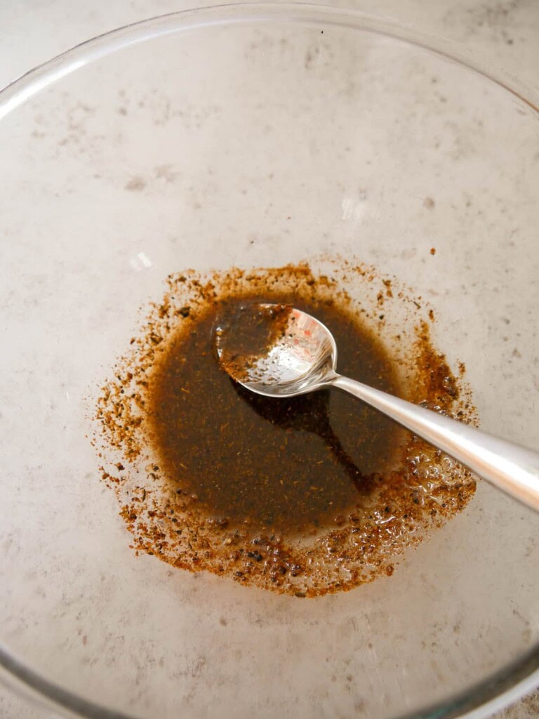A bowl of Cajun spice marinade.