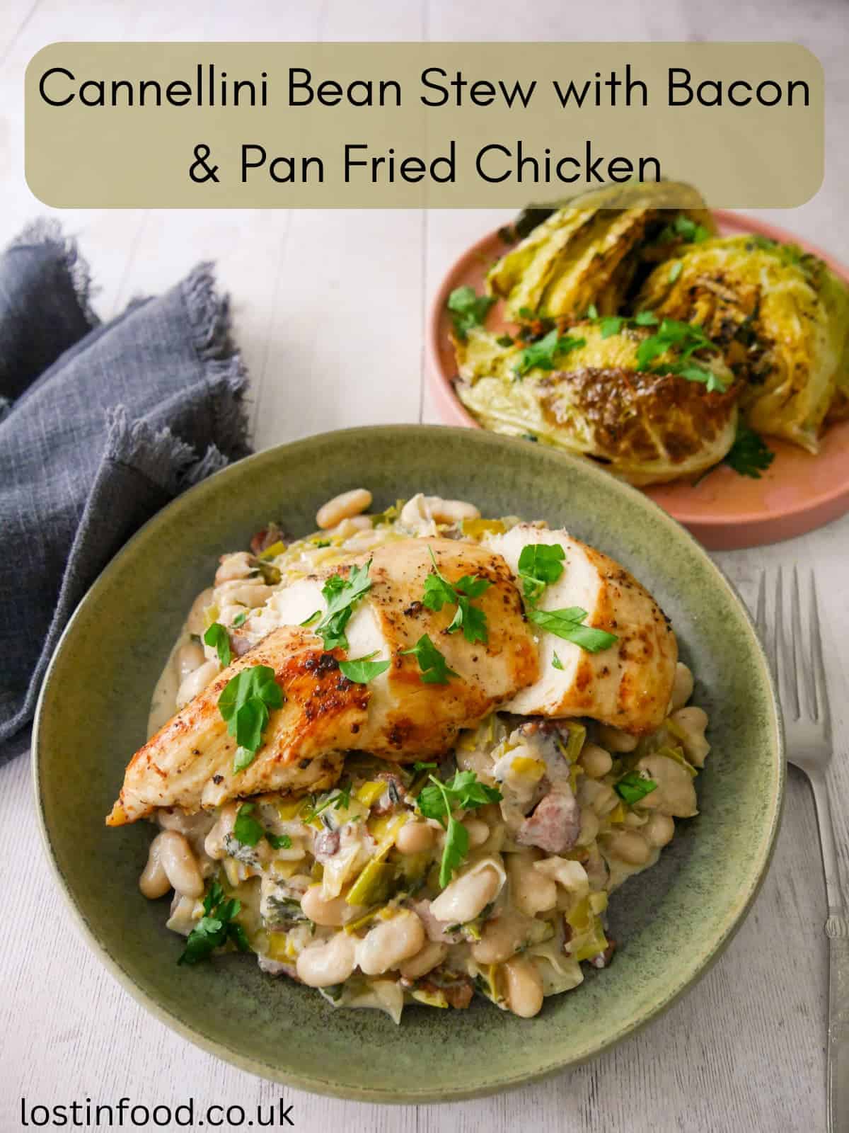 Pinnable image with recipe title and a bowl of cannellini bean stew with bacon and leek topped with sliced cooked chicken breast, with charred cabbage wedges served in a plate alongside.